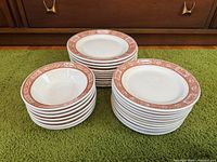 Stacks of large plates, small plates and bowls showing overall quantity