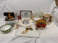 Group shot showing full assortment of dishware, glasses, figurines and decor