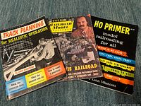 Front covers of the three model railroading publications