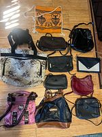 All twelve bags laid out showing variety and scale