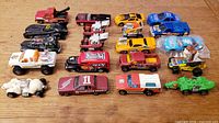 All 20 cars laid out in four rows for overview