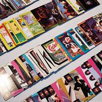 Rows of assorted vintage trading card magnets laid out face up