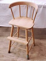 Front view of unfinished wood toddler chair