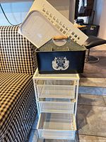 All four storage items grouped; cart, caddy, basket, board visible