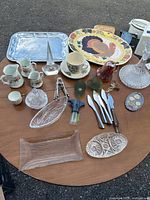 Assorted kitchen and serveware on round table