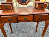 Front view vanity showing drawers and legs