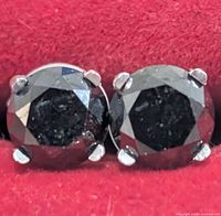 Front view of both black diamond studs in red case