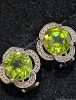 front view of both earrings showing peridot and clear accent stones