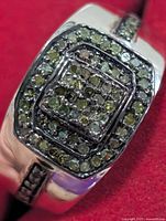 Close-up of diamond cluster on ring head