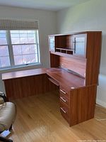 Full view of L-shaped desk with attached hutch