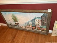 Full view of framed painting against wall