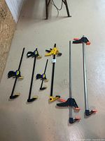 All six bar clamps laid out for size comparison