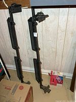 two full roof rack bars standing upright