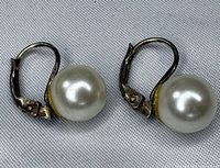 Pair of sterling silver leverback earrings with faux pearls
