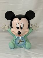 Front view of Baby Mickey Mouse figure clock