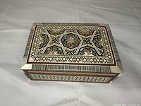 Top view showing full mosaic pattern and mother-of-pearl inlay