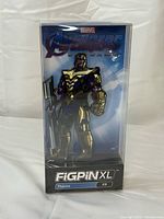 Front view of FiGPiN XL Thanos X9 in display case