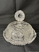 Full view of covered crystal dish with lid on base