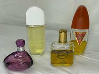 Group shot of four fragrance bottles