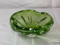 Side profile showing free-form shape and controlled bubbles