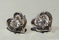 Front view showing heart shape and diamonds