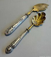 Overall view of both 800 silver servers showing design and size