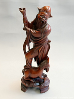 Full view of carved wood Zhang Guo Lao with donkey on pedestal