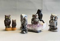 Front view of all six owl figurines