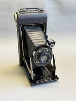 Camera opened showing bellows and lens board