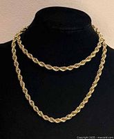 Necklace displayed on bust to show length and rope design