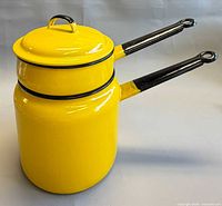 assembled yellow enamel double boiler side view