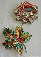 Both brooches front view