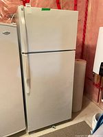 Full front view of GE refrigerator