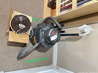 Shop-Vac vacuum and Solary vaporizer side by side on floor