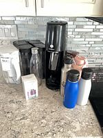 Group view: SodaStream machine, water bottles, humidifier box