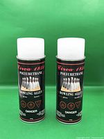 Front view of both aerosol cans