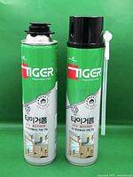 Front view of both Tiger polyurethane foam cans