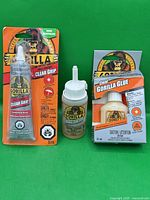 Front view of all three Gorilla adhesive products
