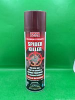 Full view of Doktor Doom Spider Killer can against green background