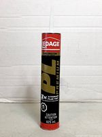 Front view of full LePage PL Premium adhesive tube showing branding and 825 mL size.