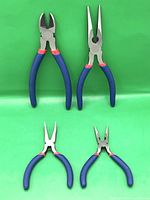All four pliers displayed on green background