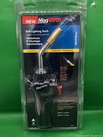 Front view of sealed Mag-Torch self-lighting torch in blister packaging