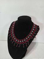 Choker displayed on stand, showing full front view