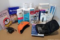 All items in lot arranged against white backdrop