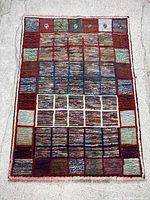 Full view of the Gabbeh rug showing overall pattern and dimensions