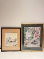 Both framed artworks side by side