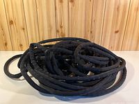 coiled black expandable hose