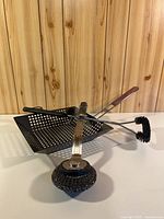 All items grouped: basket with handle, round scrubber brush, wire bristle brush