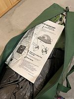 Setup instructions sheet on top of packed tent inside bag
