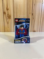 Front of sealed LEGO Superman LED key light package